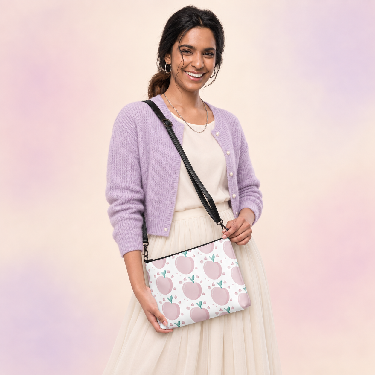 Peachy Joy Crossbody Bag worn with a lavender cardigan and cream skirt